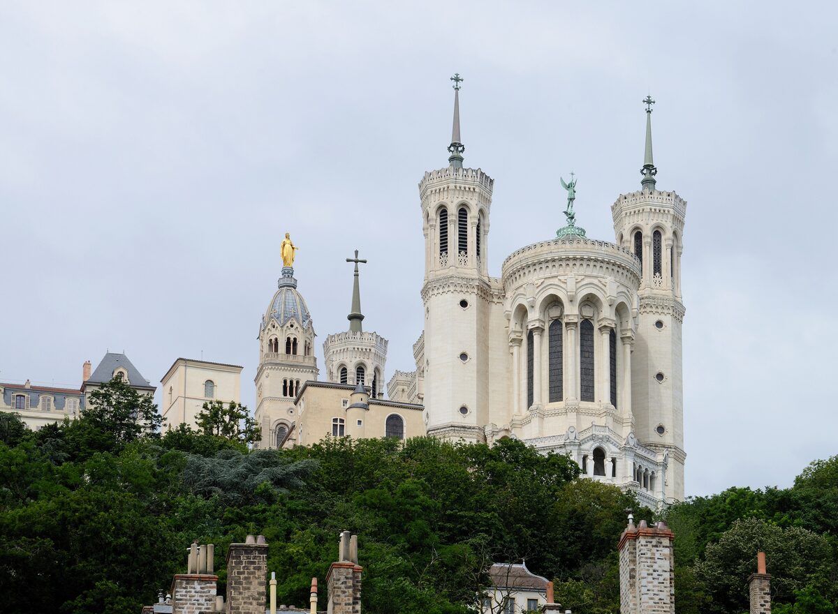 The white basilica of Fourvière on its hill above the rooftops of Lyon