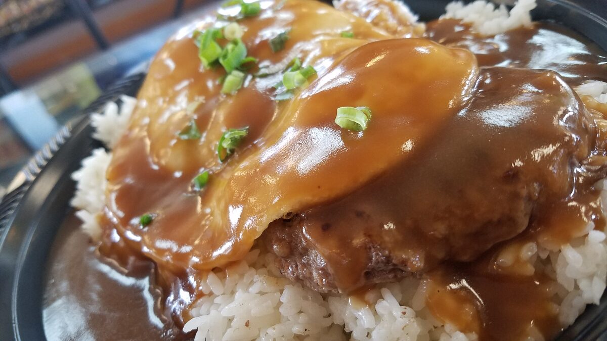 Loco moco: a hamburger patty and fried egg on rice under brown gravy