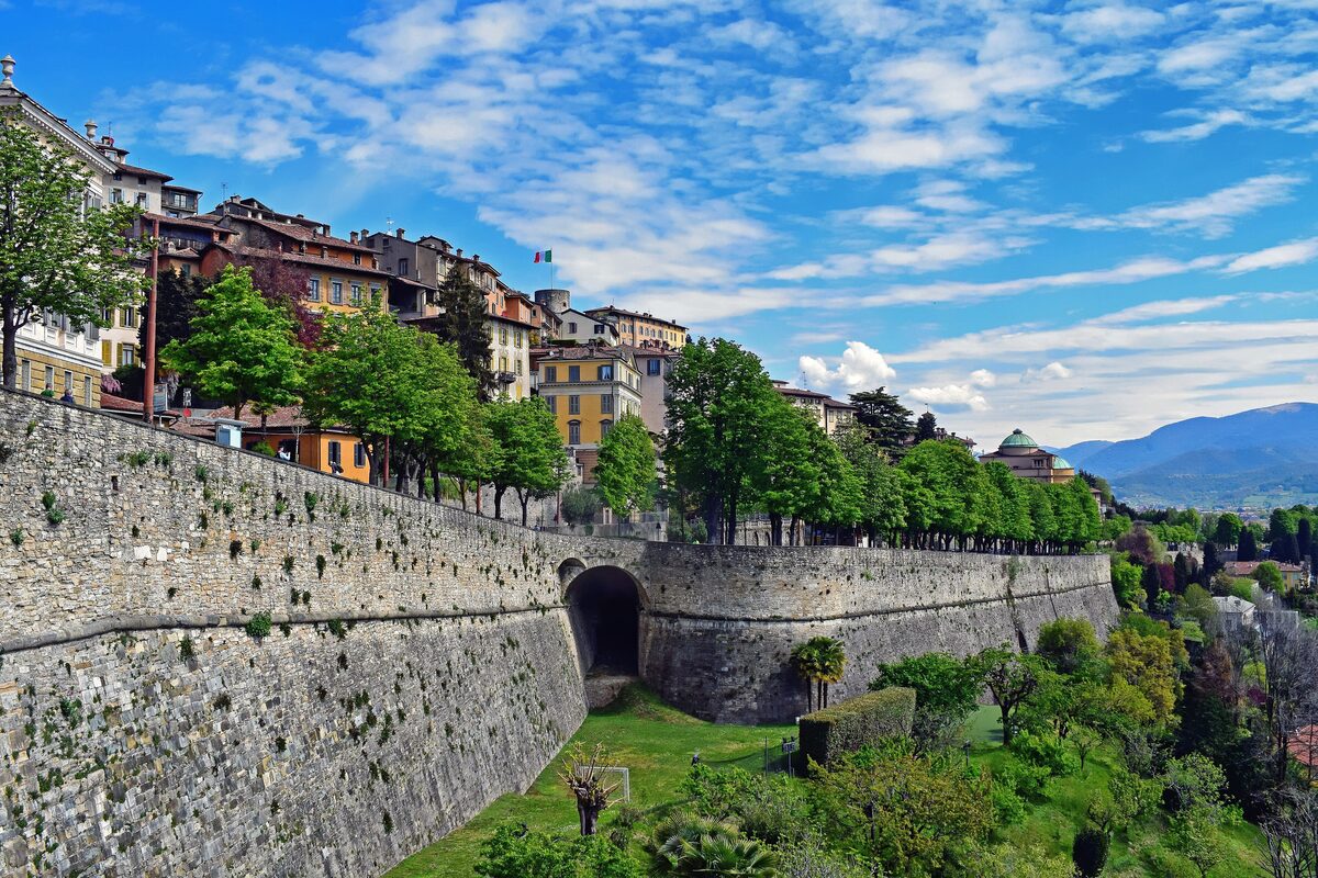 The Venetian Walls of Bergamo above the old town houses