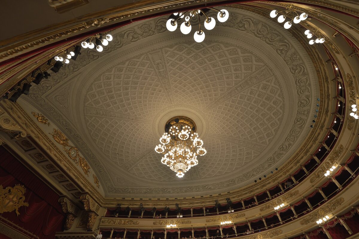 The ceiling, chandelier and tiers of boxes inside La Scala