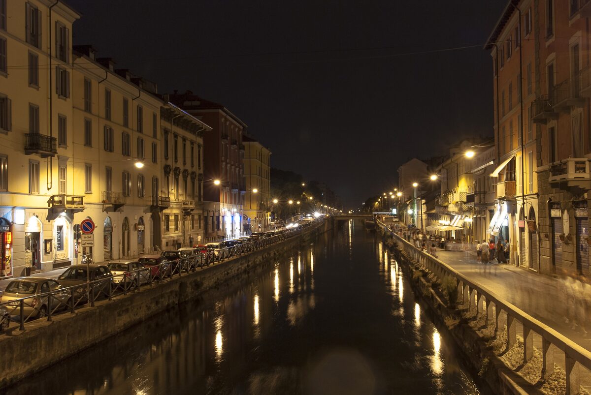 The Naviglio Grande lit by streetlamps at night