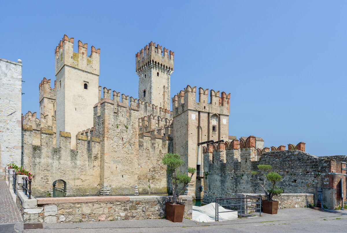 The brick Scaligero castle by the water at Sirmione