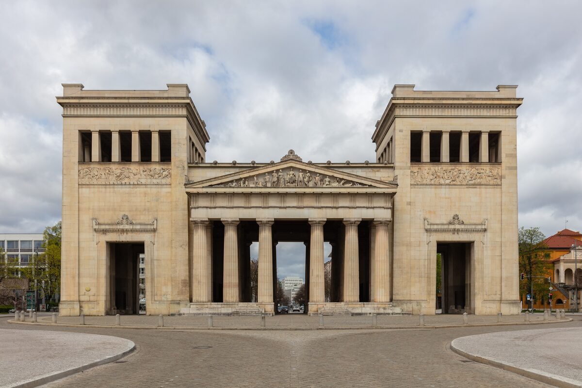 The Propyläen, a Greek-style gateway with two square towers and a row of columns, on Königsplatz