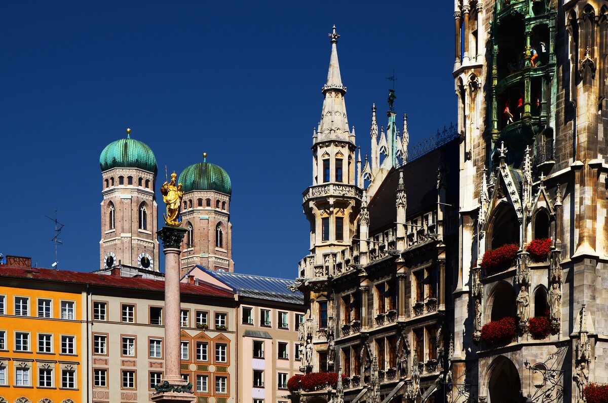The Mariensäule, the twin domes of the Frauenkirche and the Gothic tower of the New Town Hall with its Glockenspiel, seen from Marienplatz