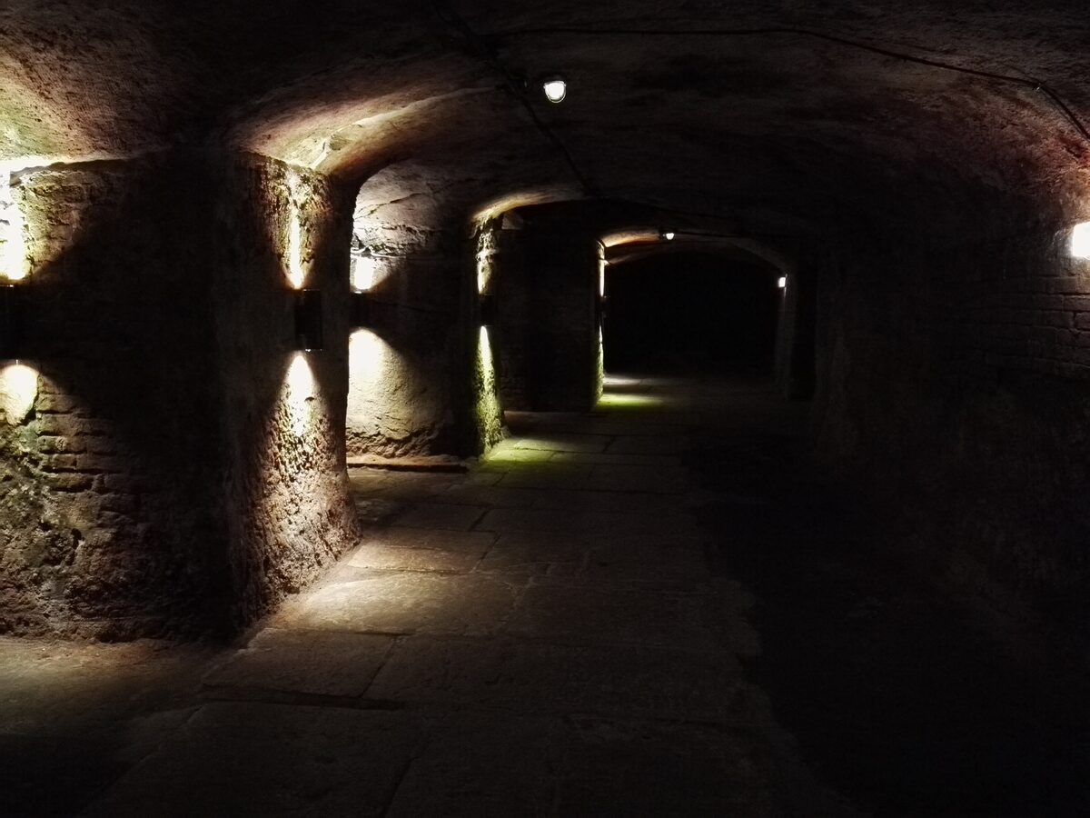 A lit passage cut into the sandstone in the Nuremberg rock-cut cellars
