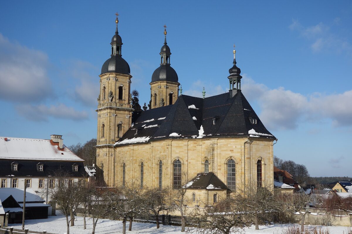 The Baroque pilgrimage basilica at Gößweinstein with its twin onion-domed towers and a dusting of snow