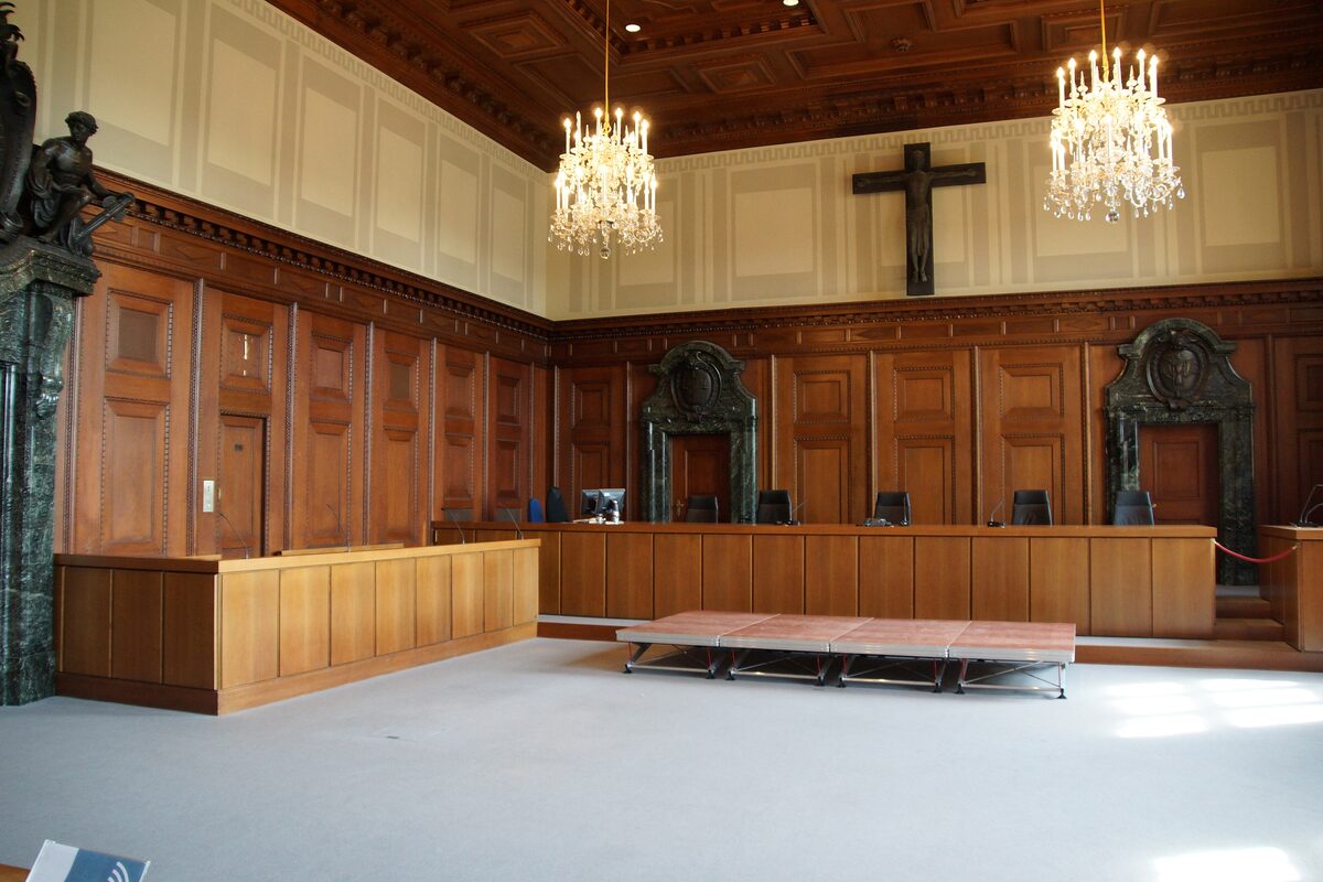 Courtroom 600 with its wood paneling, crucifix and chandeliers, where the Nuremberg Trials were held
