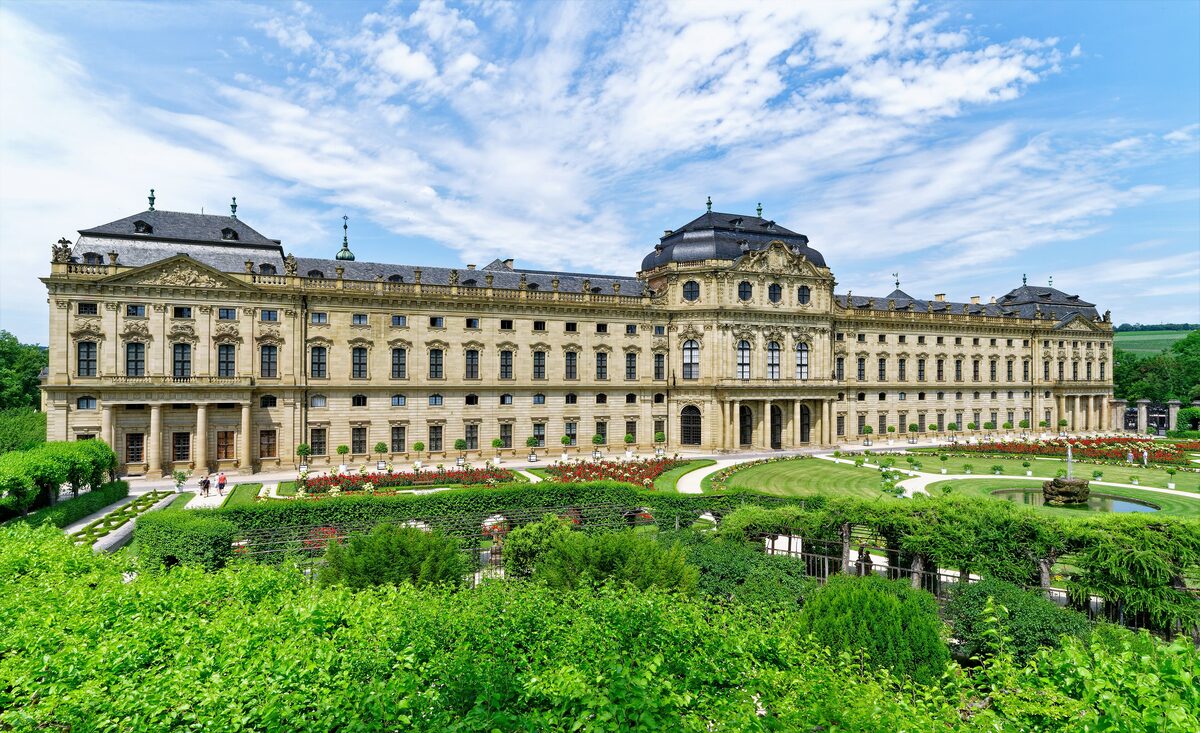 The long Baroque Residenz in Würzburg seen over its garden terraces