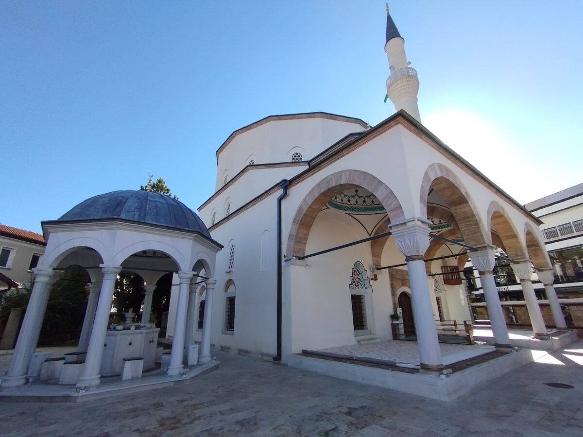 The Ali Pasha Mosque in Ohrid, with its minaret rising behind a domed fountain