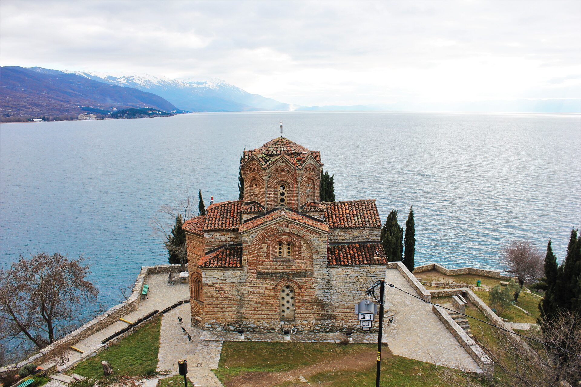 The Church of St. John at Kaneo on its cliff above the blue water of Lake Ohrid