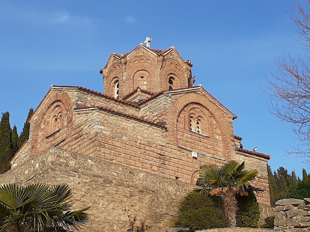 The brick walls and domes of St. John at Kaneo seen from the side