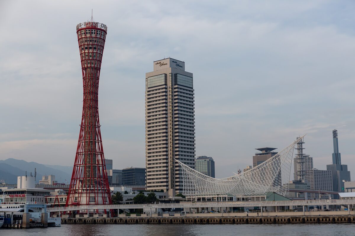 Kobe Port Tower, the red lattice tower by the harbor, beside the tall hotel towers
