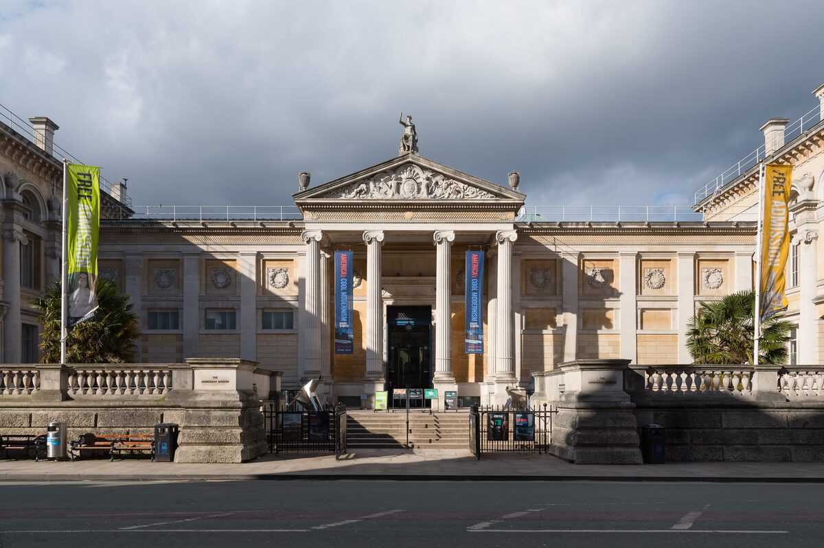 The classical front of the Ashmolean Museum in Oxford, with tall Ionic columns and steps