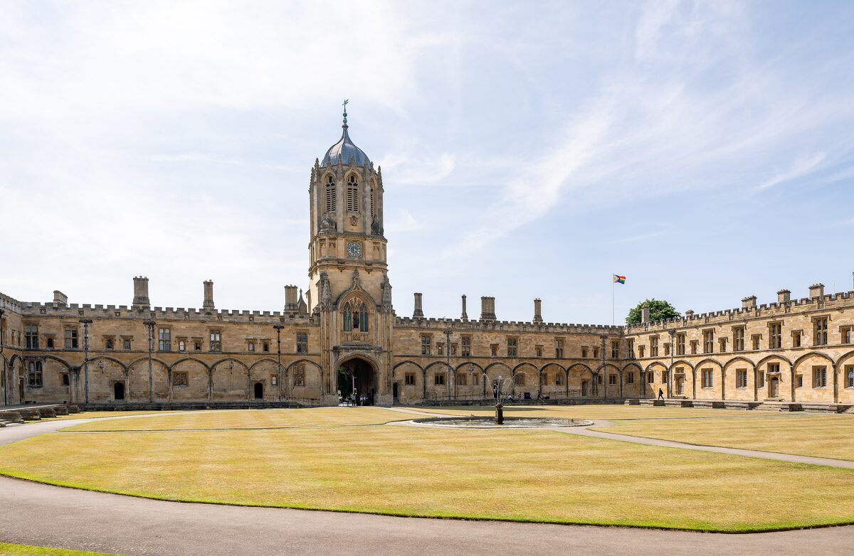 Tom Quad at Christ Church, Oxford, a vast stone courtyard with a fountain, and Wren's Tom Tower over the gate