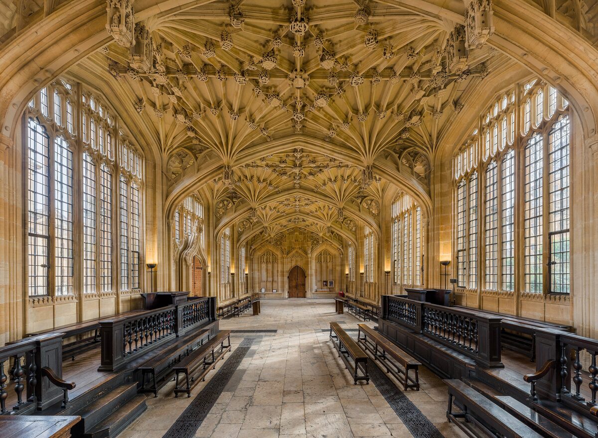 The Divinity School in the Bodleian Library, a Gothic hall with an elaborate stone vaulted ceiling and tall windows