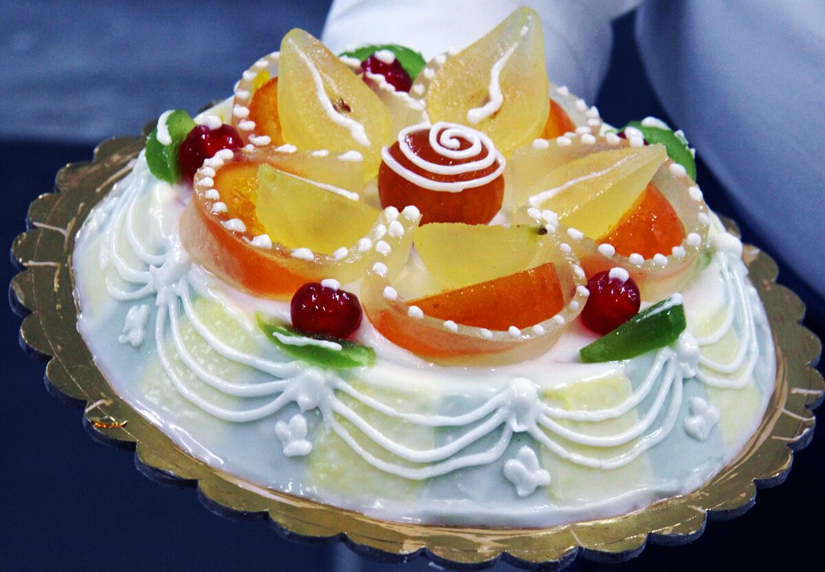 A Sicilian cassata covered in candied fruit and white icing