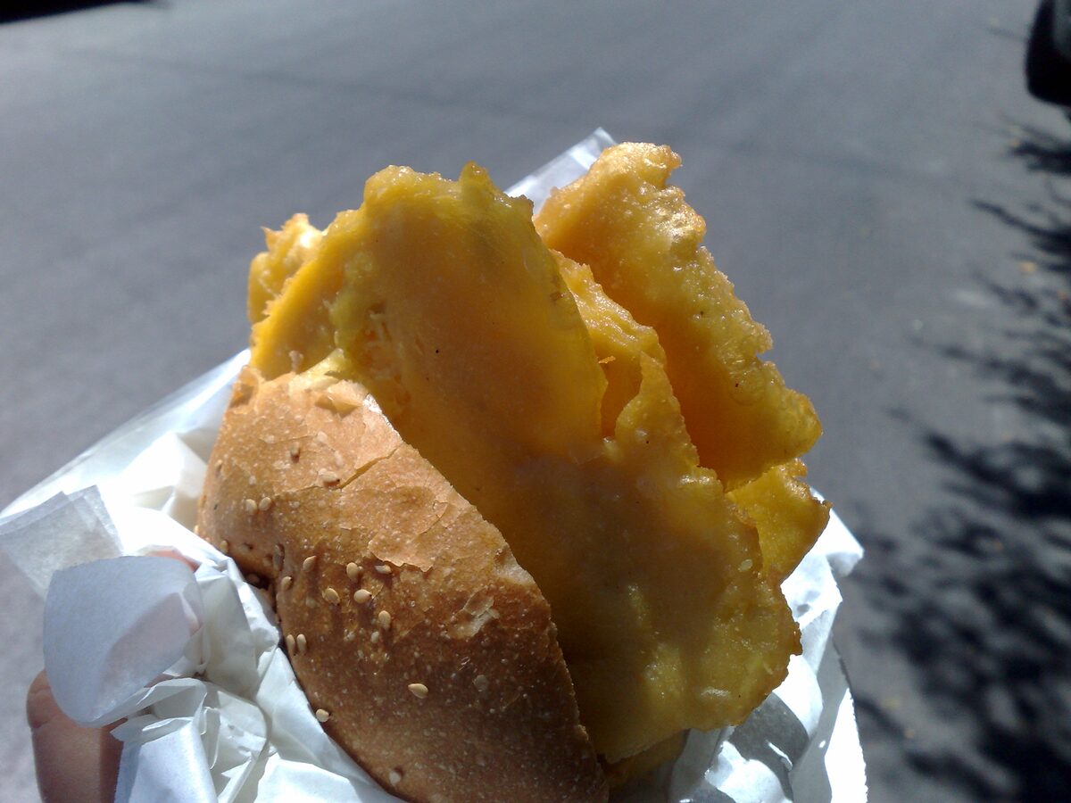 Chickpea fritters in a sesame roll, the classic panelle sandwich