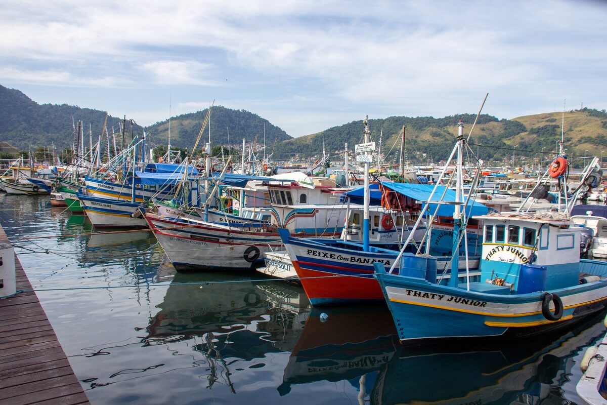 Fishing boats moored side by side in the harbor of Angra dos Reis