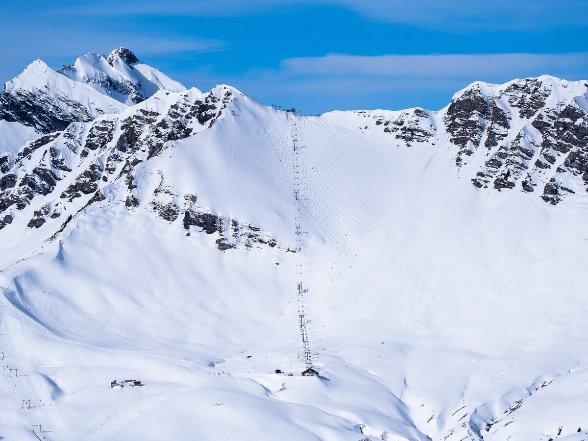 Snowy slopes and a lift line at the Pas de Chavanette on the French and Swiss border