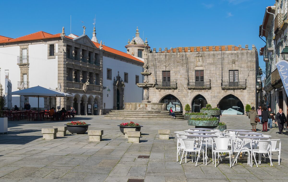 The Praça da República in Viana do Castelo, with stone arcades and café tables in the square