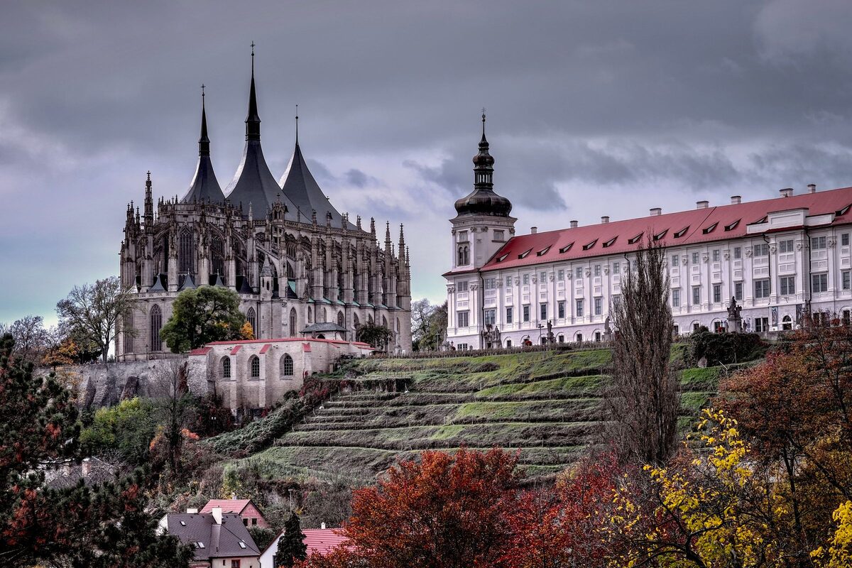 St. Barbara's Cathedral in Kutná Hora with its steep Gothic roofs and the Jesuit college beside it
