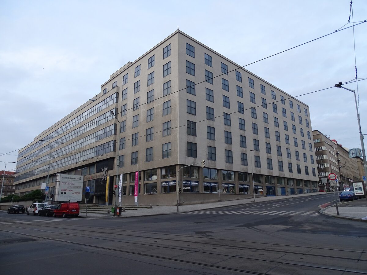 The Veletrzni Palace, a large functionalist building on a tram corner in Holesovice