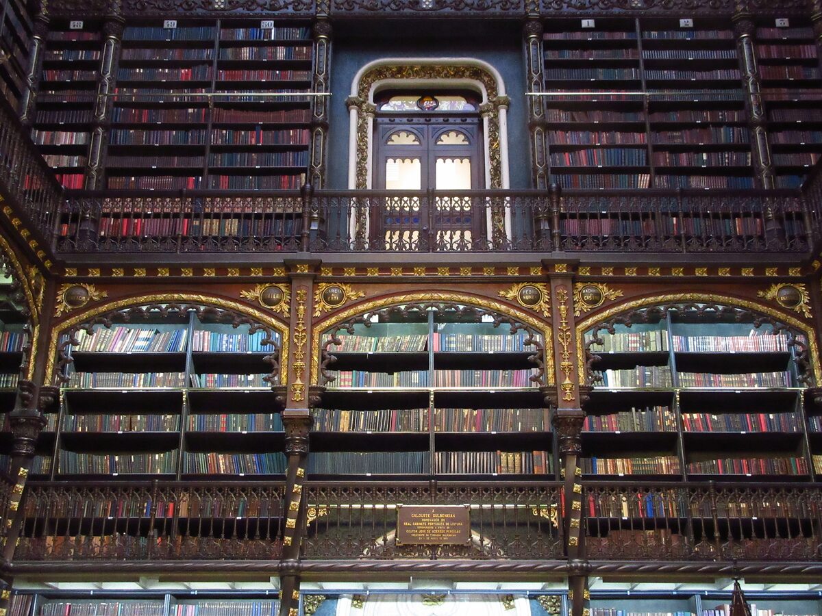 The reading room of the Real Gabinete Português de Leitura, with tiers of wrought-iron galleries and bookshelves up to the ceiling