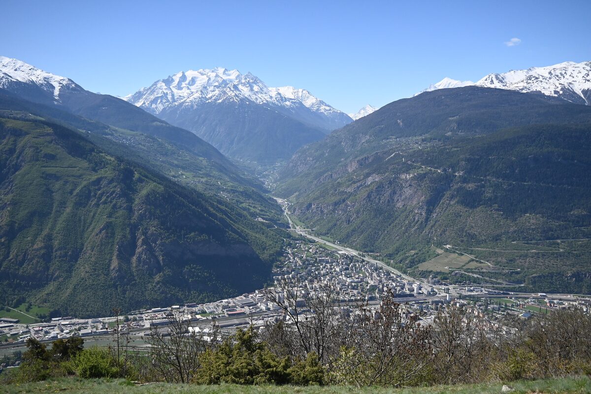 Visp in its valley, seen in spring with snow on the peaks