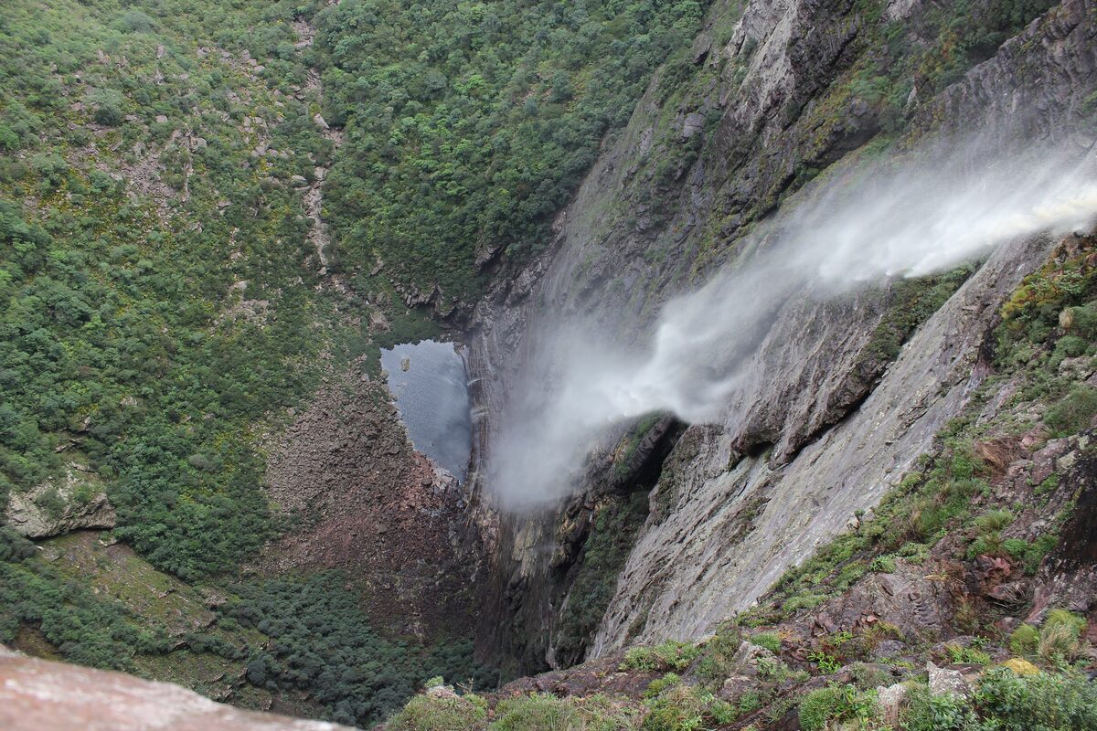 The Cachoeira da Fumaça in the Chapada Diamantina seen from above, its water blown to mist before it reaches the pool far below