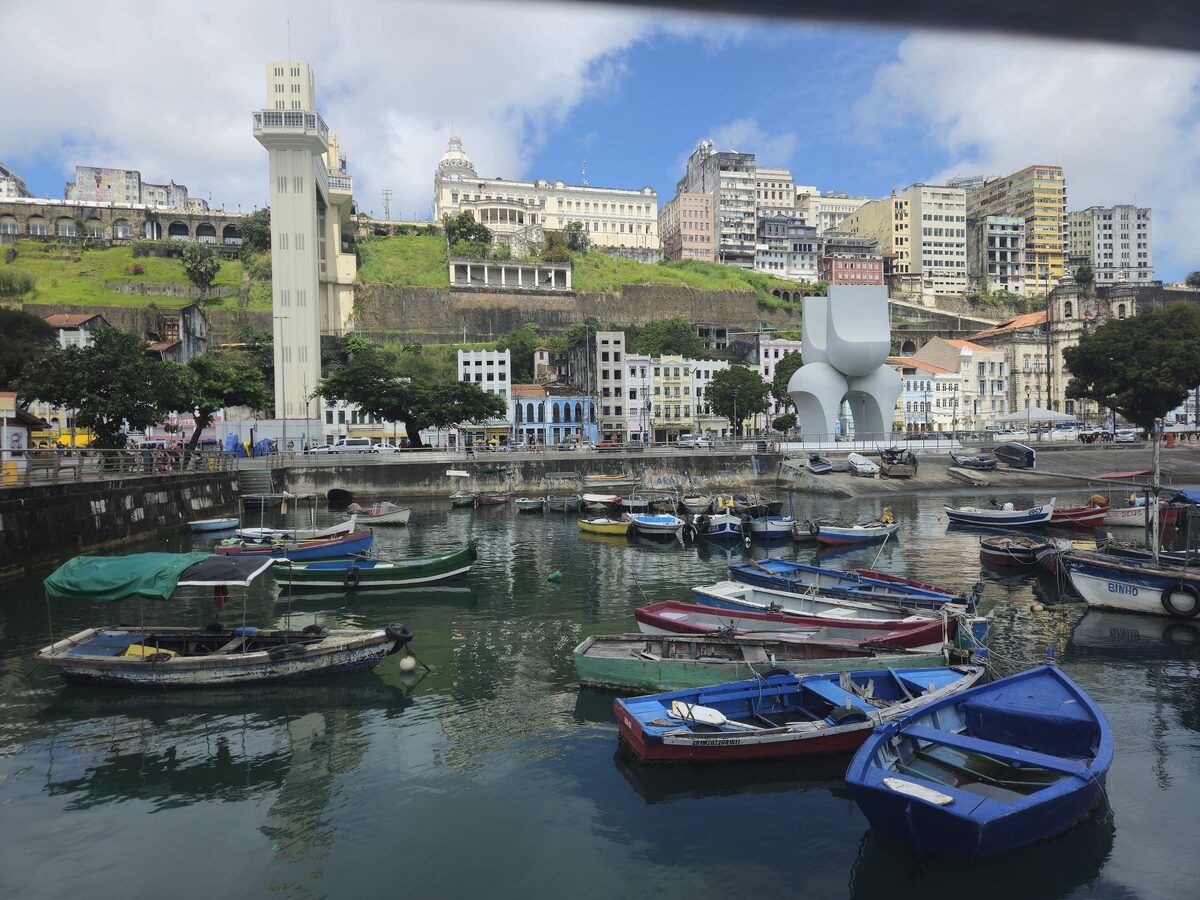 The Lacerda Elevator tower above the bay, with fishing boats moored in the water below