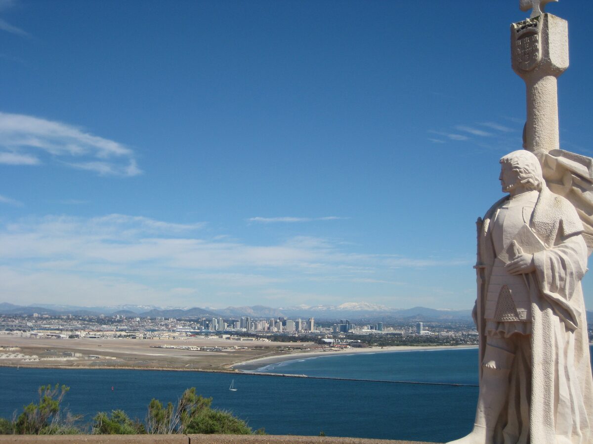 The Cabrillo statue on Point Loma looking over the bay to downtown