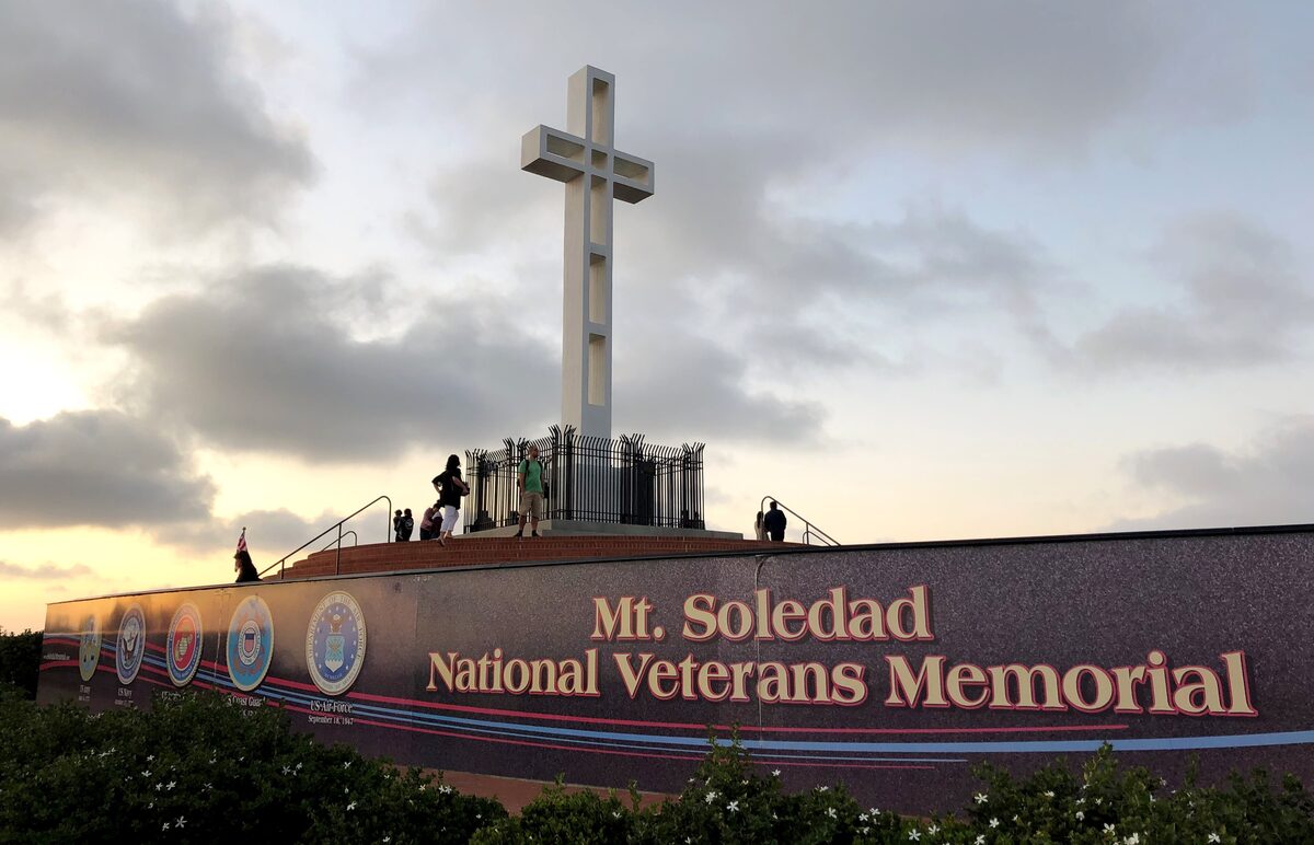 The Mount Soledad veterans memorial cross above its curved wall