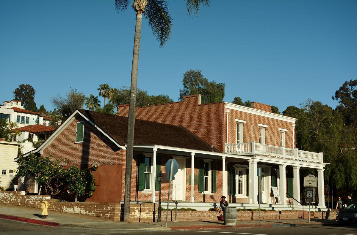 The brick Whaley House with its white porch in Old Town