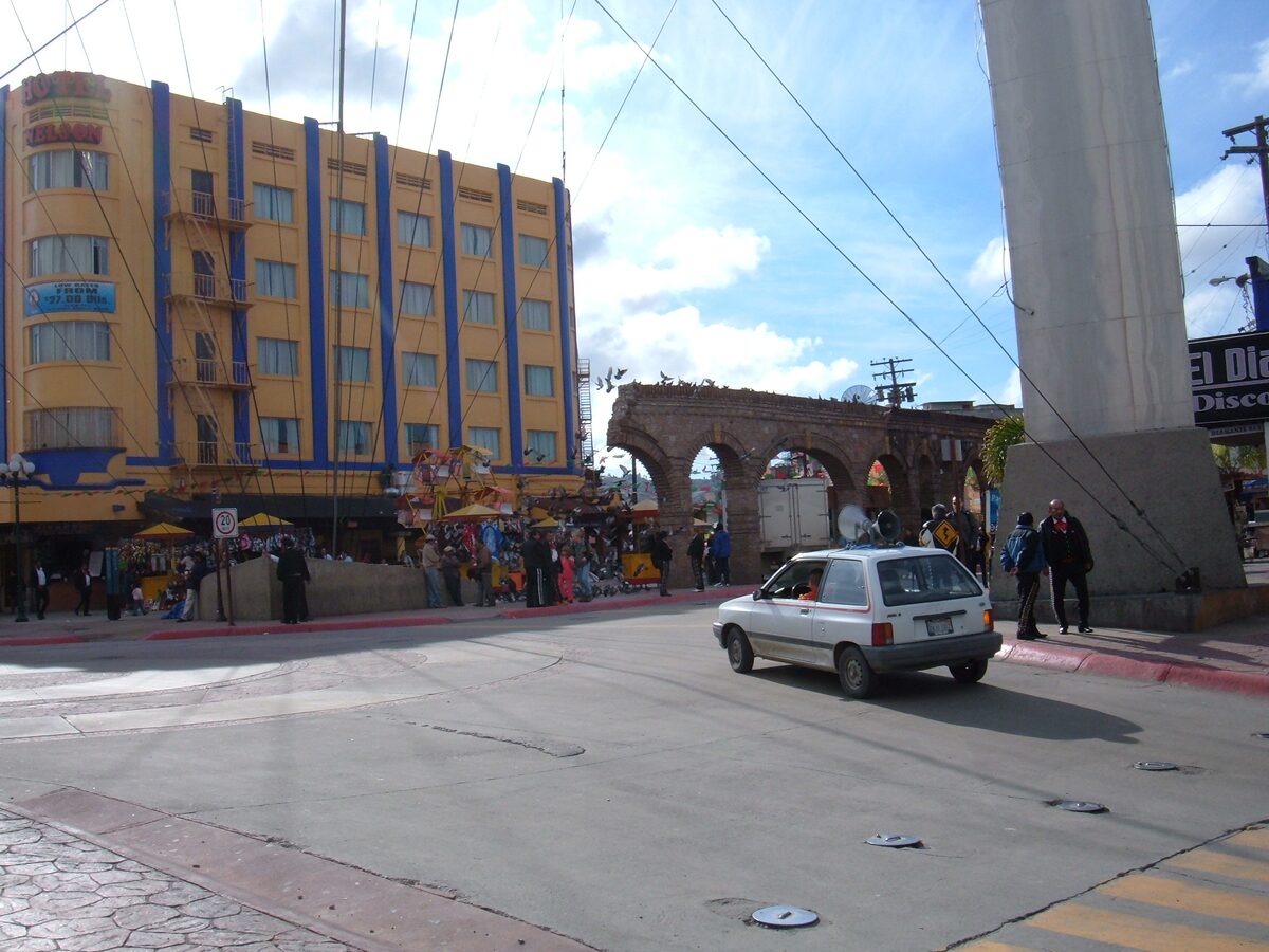 The Avenida Revolucion arch and colorful buildings in Tijuana