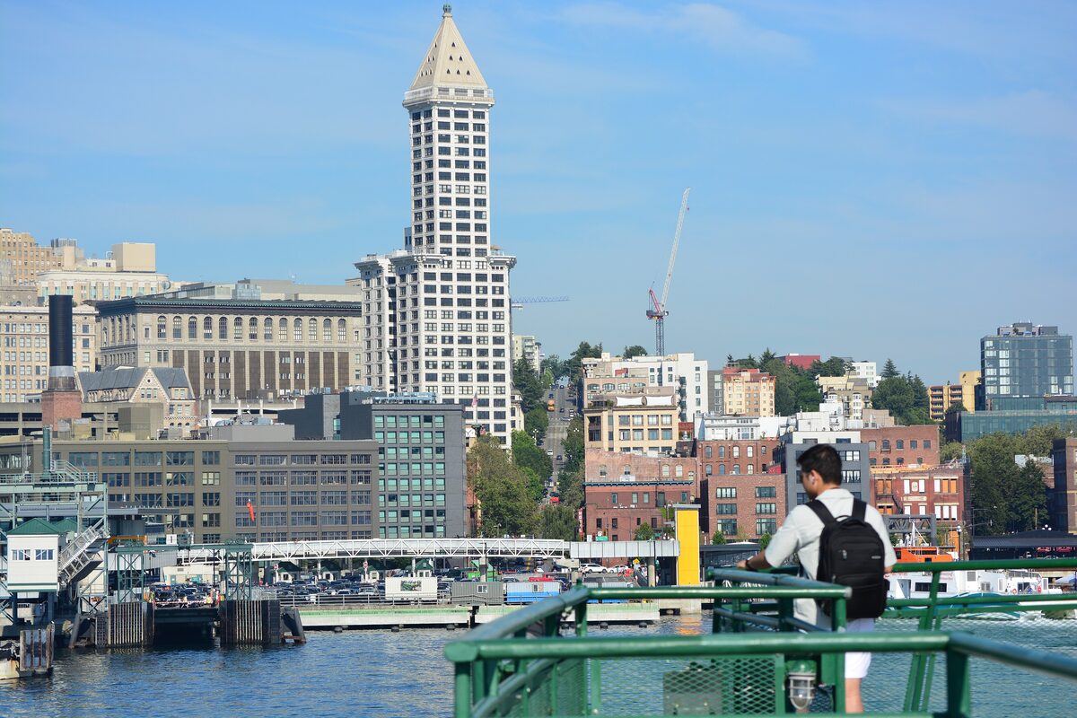 Smith Tower rising above Pioneer Square, seen from an approaching ferry