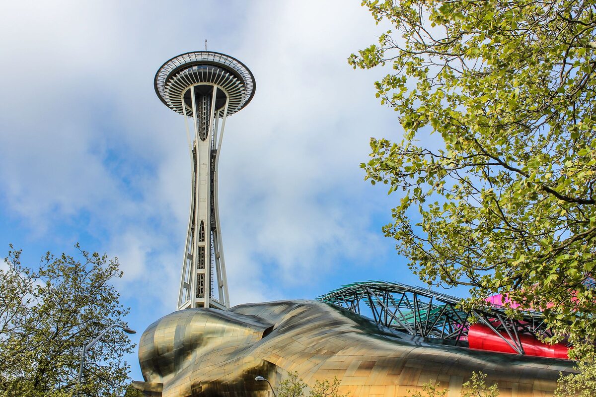 Space Needle rising over the Museum of Pop Culture and monorail