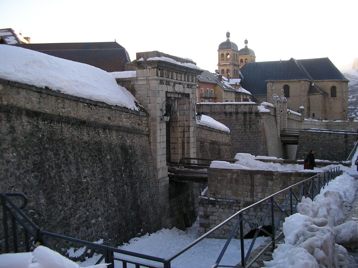 Briançon's walls and church towers under snow in winter