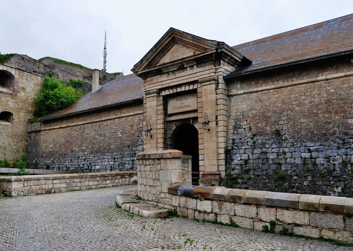 The Porte de Pignerol, a stone gate with a pediment in the Vauban walls of Briançon