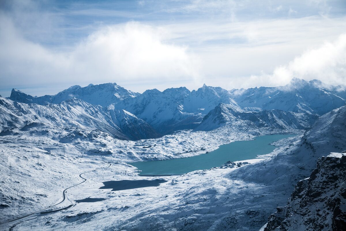 The view from Diavolezza over snowy Bernina peaks and the turquoise Lago Bianco