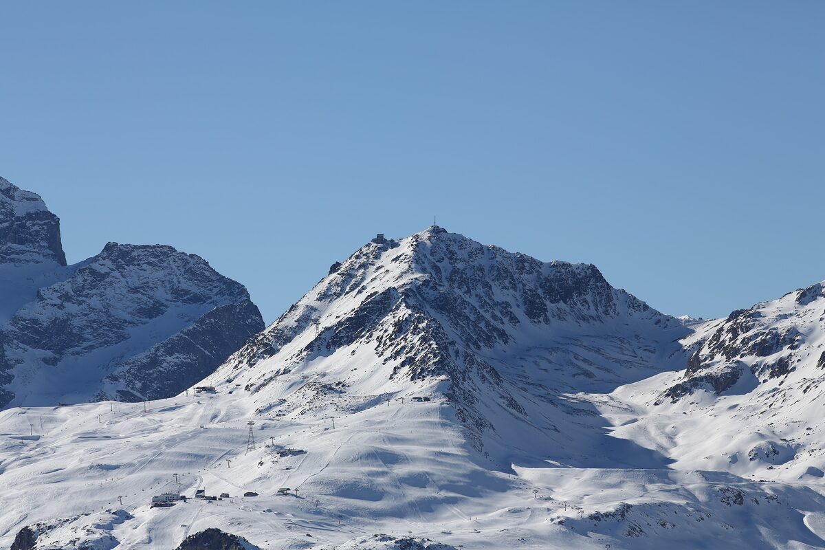 Snow-covered Piz Nair, the town's own summit, seen from Muottas Muragl