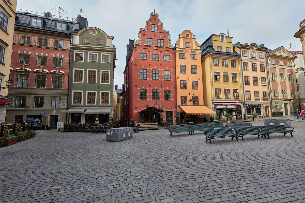 The tall red, yellow and green gabled merchants' houses on Stortorget square in Gamla stan