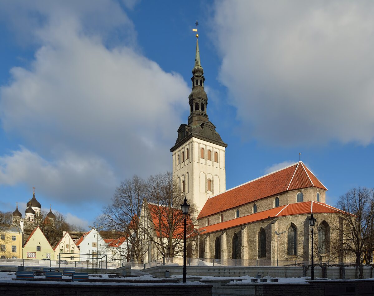 The spire and red-tiled roof of St Nicholas' Church, now the Niguliste Museum, above the Old Town