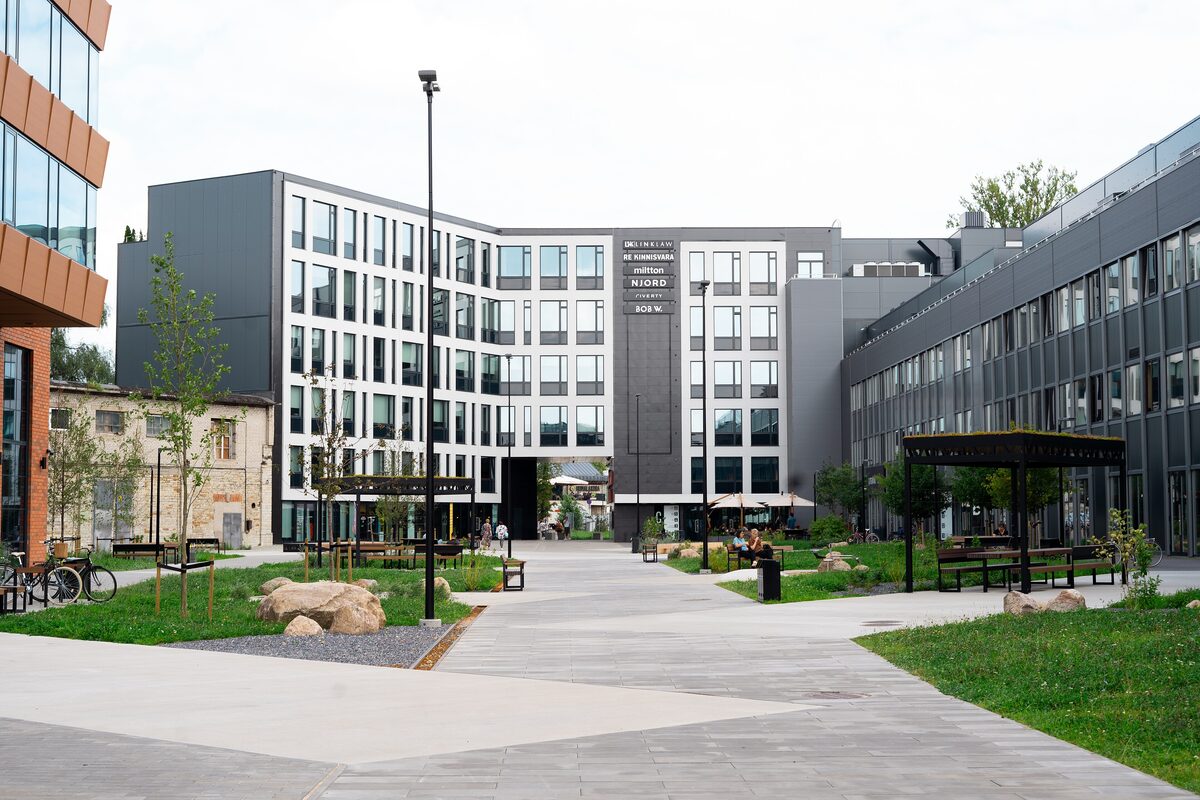 Modern office blocks and a paved courtyard in the Telliskivi Creative City