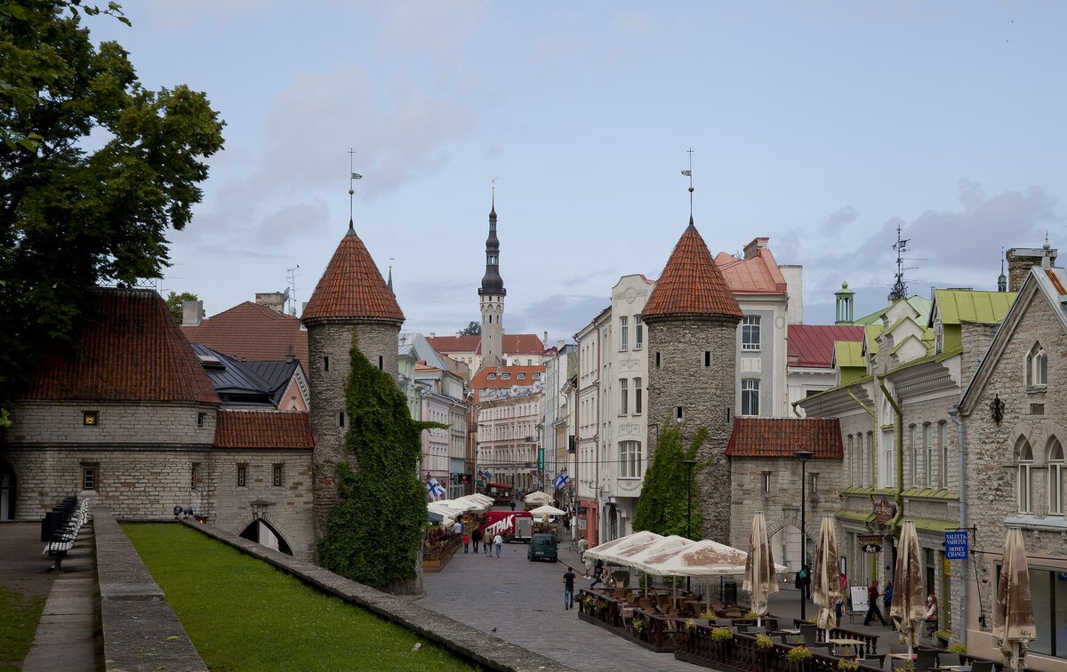 The round Viru Gate towers and the pedestrian Viru Street beyond them in the Old Town