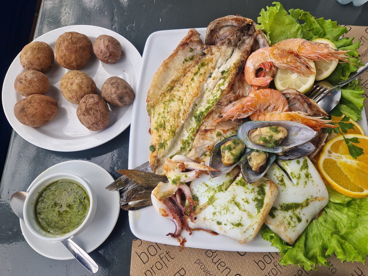 Grilled fish, prawns and squid with wrinkled potatoes and green mojo, photographed on La Palma
