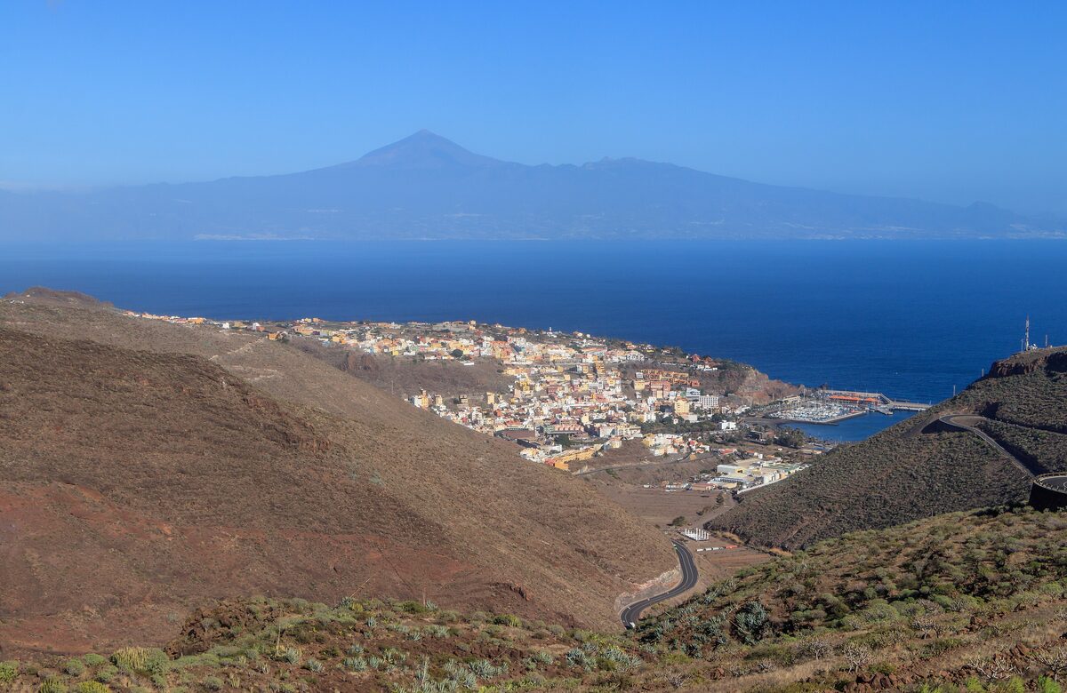 San Sebastián de La Gomera on the hillside, with Tenerife's Teide across the sea