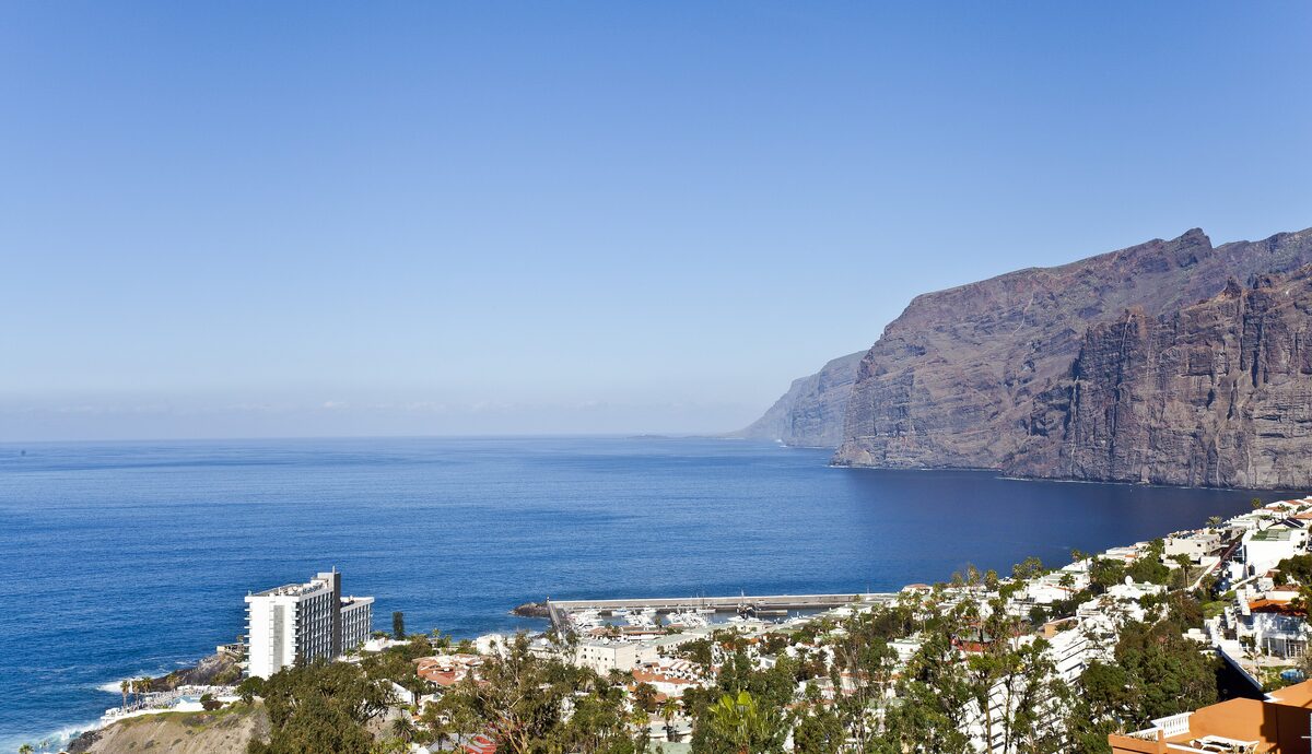 The Los Gigantes cliffs above the sea, with the town and harbor at their foot