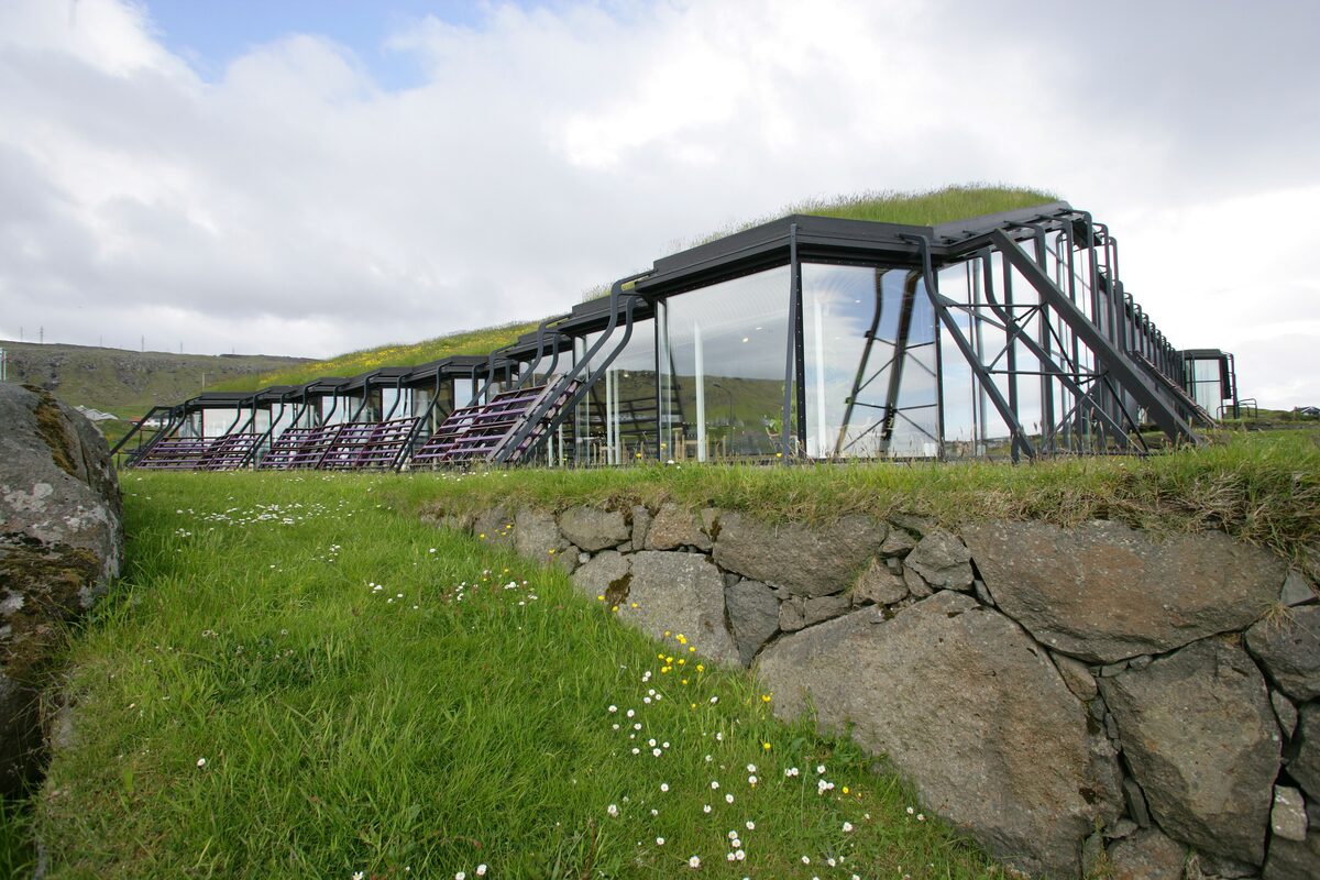 The Nordic House in Tórshavn, its grass roof and stone walls set into the hillside