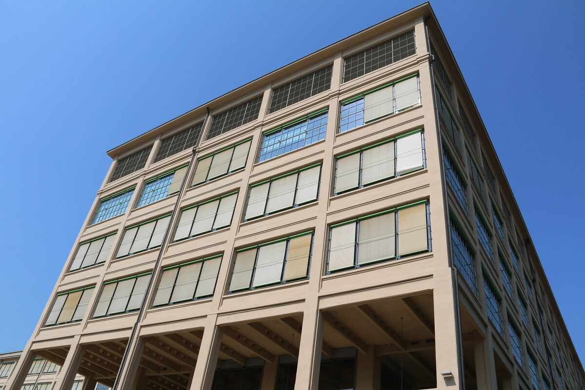 The concrete Lingotto factory building with rows of windows