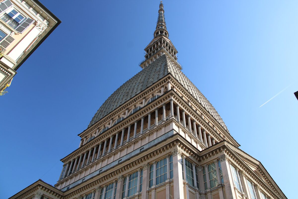 The Mole Antonelliana seen from below against a blue sky